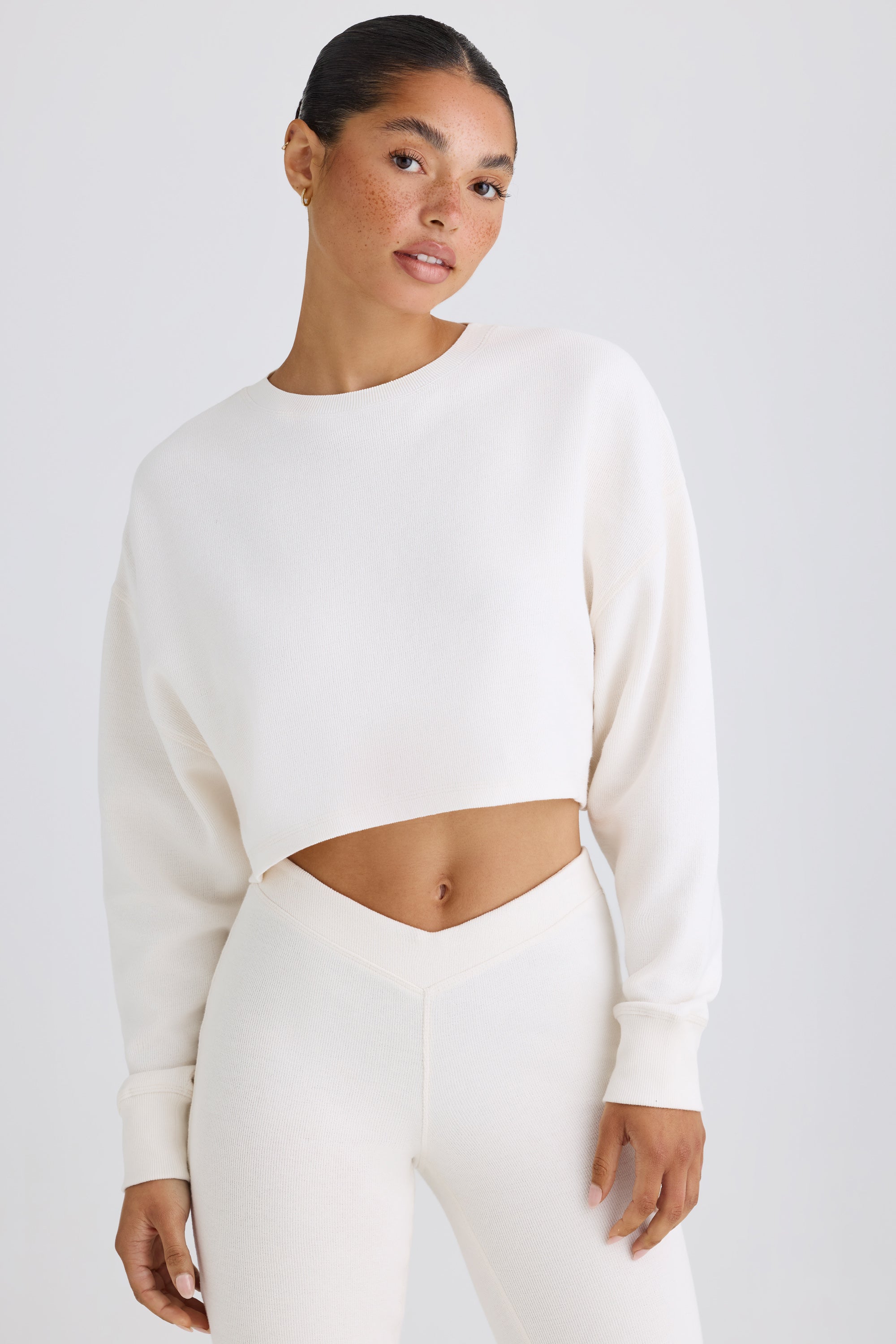 Textured Cotton Jersey Open-Back Cropped Sweatshirt in White