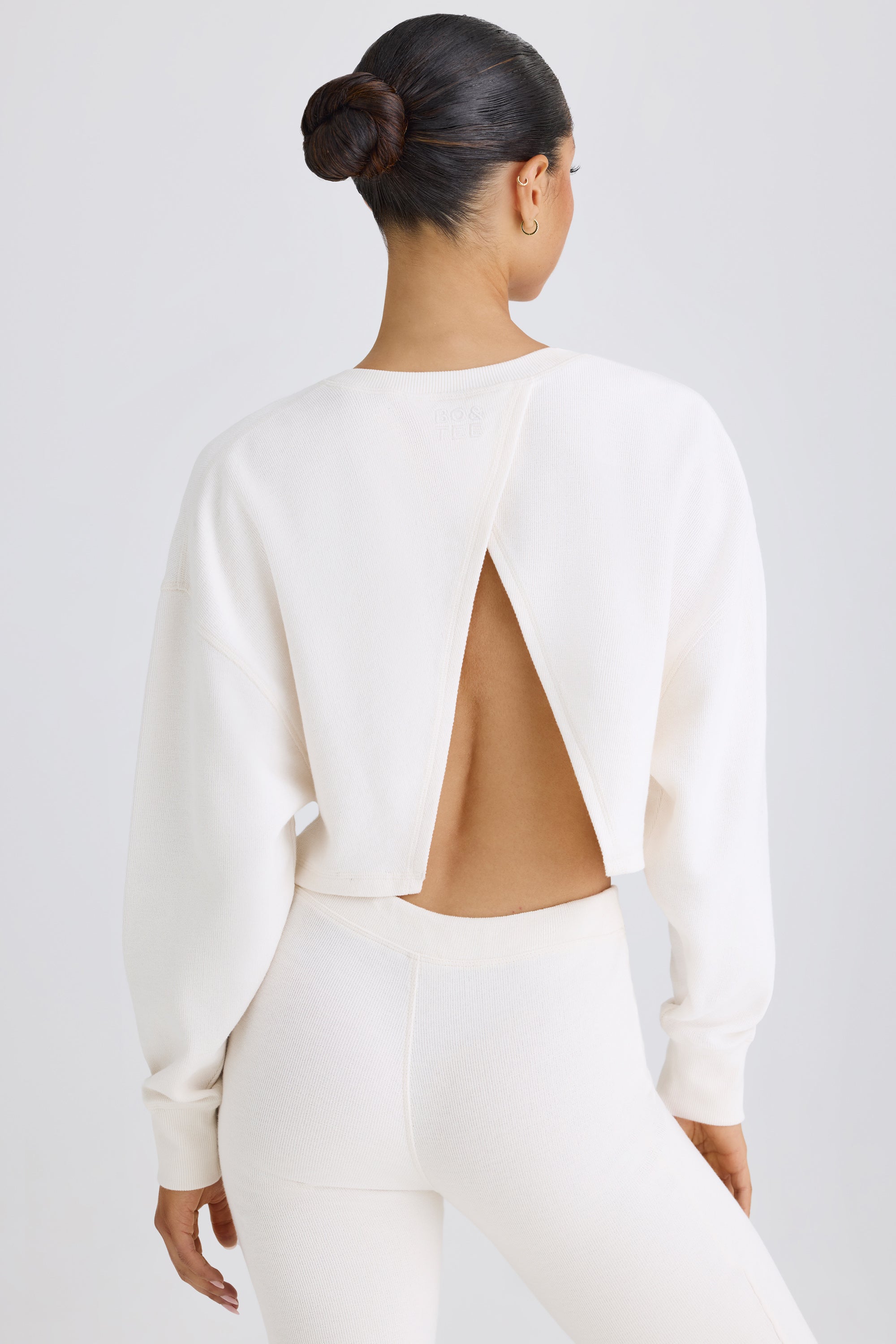 Textured Cotton Jersey Open-Back Cropped Sweatshirt in White