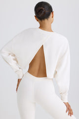 Textured Cotton Jersey Open-Back Cropped Sweatshirt in White